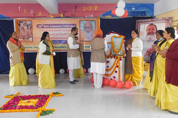 Maharshi Vidya Mandir Naini, celebrated 150th Birthday Anniversary of His Divinity Gurudev Shri Swami Brahmanand Saraswati Ji .The celebration commenced with Special Shri Guru Parampara Poojan and followed by lighting of lamp by Principal.